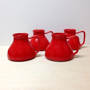 Set of four (4) Vintage Red Ceramic Pitchers/ Jars/Vases with foam padding, JAPAN