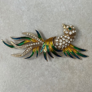 Vintage bird gold tone metal rhinestone brooch