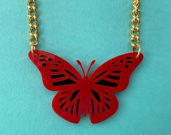 Red acrylic butterfly necklace