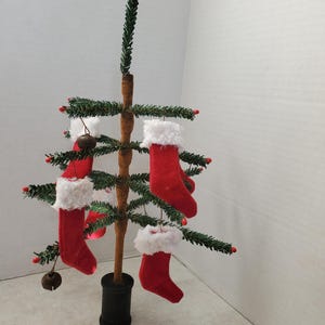 Primitive Christmas faux Feather Tree with red wool stocking ornaments, faux feather tree, German feather tree, Primitive tree,  farmhouse