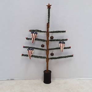 Primitive Faux German Single Feather Tree with rusty star and Americana hearts
