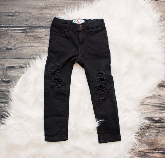 girls black ripped skinny jeans