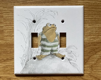 Cubierta de interruptor de luz de doble clavija de rana y sapo