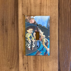 Jessie and Woody Toy Story Light Switch Cover, Toy Story Decor, Toy Story Jessie, Toy Story Woody, Toy Story Decor, Toy Story Nursery, TS5 bild 1