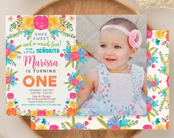 May include: A colourful floral birthday invitation with a photo of a baby girl. The invitation says "She's sweet and so much fun! Our little Senorita Marissa is turning one."