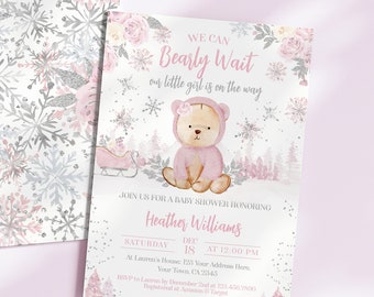 May include: A pink and white baby shower invitation with a watercolor illustration of a bear wearing a pink hat and a snowflake background. The text reads "We can Bearly Wait our little girl is on the way".