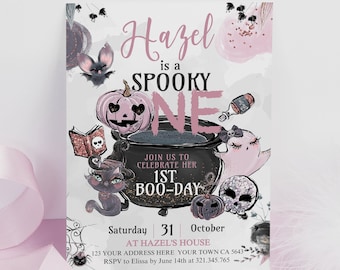 May include: A pink and black Halloween-themed invitation for a first birthday party. The invitation features a cauldron, a ghost, a black cat, and a pumpkin. The text on the invitation reads "Hazel is a Spooky One" and "Join us to celebrate her 1st Boo-Day".