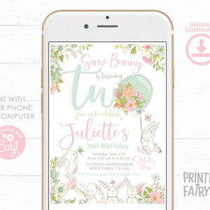 May include: A digital invitation on a smartphone screen for a second birthday party. The design features a bunny theme with floral accents, a balloon, and the text "Some Bunny is turning Two." The invitation includes editable fields.