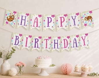 May include: A two-tiered Happy Birthday banner featuring sloth illustrations and floral patterns in pink, purple, and green. The letters are printed in a purple and pink gradient on white pennants, with sloths on the end pieces.