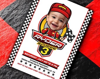 May include: A birthday invitation for a boy named Ryder turning 3. The invitation features a cartoon image of a boy wearing a racing suit and holding a checkered flag. The text "Ryder is turning 3" is written in a bold font with a red and yellow racing theme. The invitation includes the date, time, and location of the party.