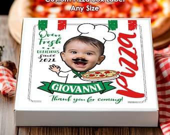 May include: A square white pizza box featuring a custom label with a cartoon chef illustration, a photo of a baby with a drawn-on mustache, and the text: Oven Fresh, DELICIOUS since 2024, GIOVANNI, pizza, and Thank you for coming! in red and green.