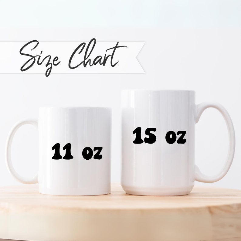 May include: Two white ceramic mugs with black text. The smaller mug is 11 oz and the larger mug is 15 oz.