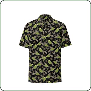 May include: Short-sleeved button-down shirt with a black background and a repeating pattern of green parrots and sprigs. The shirt has a classic collar and a relaxed fit, suitable for casual wear.