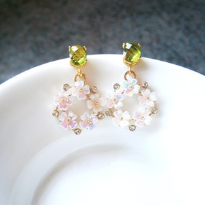 Green peridot earrings with white-pink shimmering cherry blossom pendants, gold-plated silver 925 earrings image 1