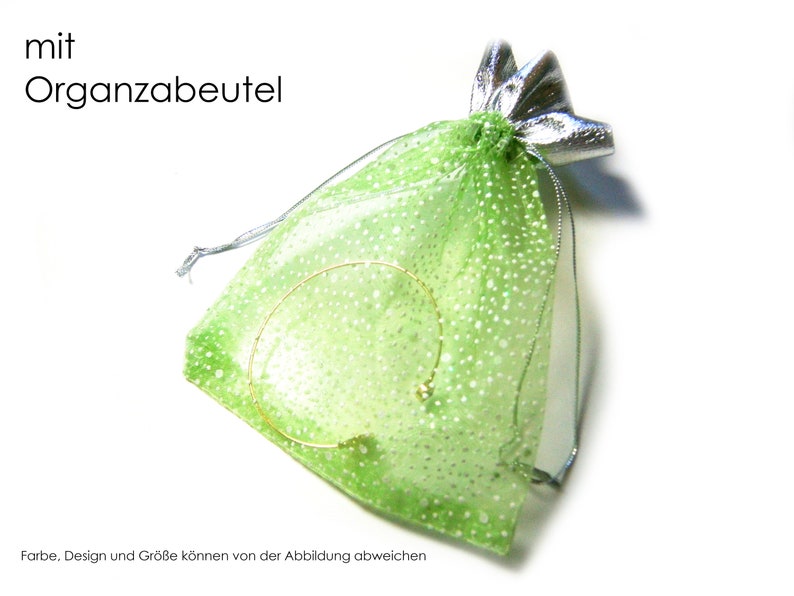 Die Ohrringe kommen in einem hübschen Organzabeutel zu dir.