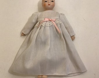 Vintage Bisque and Fabric 8” Happyland Baby Doll