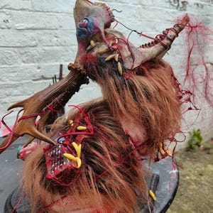 Evil Dead Rise - Ellie Deer - Necronomicon and mounted Deadite deer - Mommy&#39;s with the Maggots now