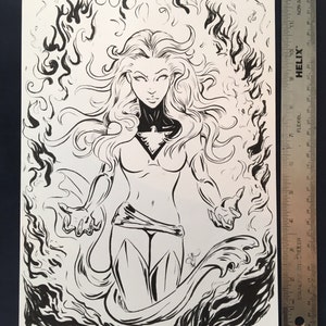May include: Black and white line art illustration of a woman with long flowing hair and a bird symbol on her chest. She is surrounded by flames.