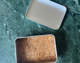 Travel tin for Shampoo Conditioner bars. Coconut fibre soap rest keeps Soap Bars dry. Zero waste travel tin that ever rusts. Eco friendly