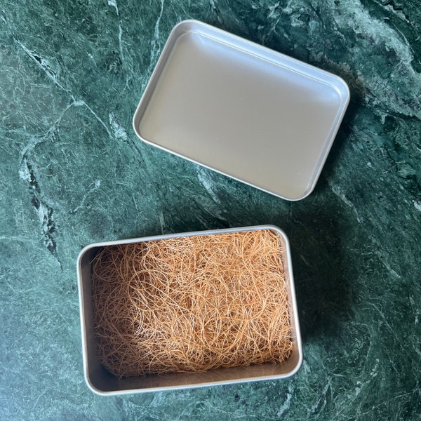 Travel tin for Shampoo Conditioner bars. Coconut fibre soap rest keeps Soap Bars dry. Zero waste travel tin that ever rusts. Eco friendly