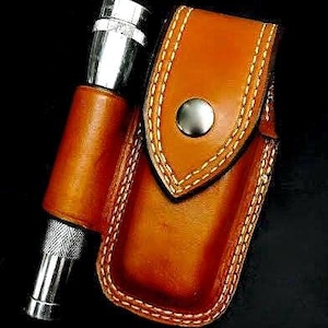 Nay&#39;s Custom Leather multi-tool case with a light loop