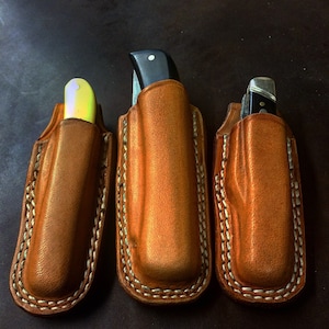 Open top belt sheath