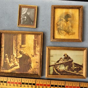 A Group of Dollhouse Miniature Wall Pictures