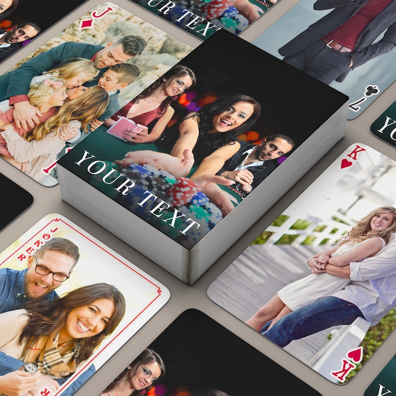 May include: A deck of playing cards with personalized photos on each card. The cards are arranged in a stack with the top card showing a photo of a woman in a casino setting. The text "YOUR TEXT" is printed on the side of the stack.
