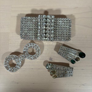 Lot of vintage faux buckles and dress clips