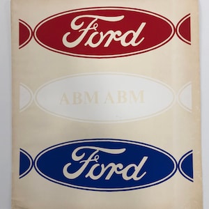 May include: A vintage Ford logo printed on a cream-colored paper. The logo is red, white, and blue. The word "Ford" is in a stylized script font.