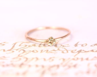 14kt. yellow gold sweet tiny little flower ring