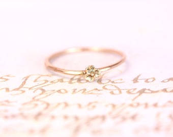 14kt. yellow gold sweet tiny little flower ring