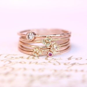 stack of gorgeous 14kt. rose & yellow gold assorted stone rings