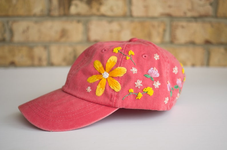 faded red baseball cap