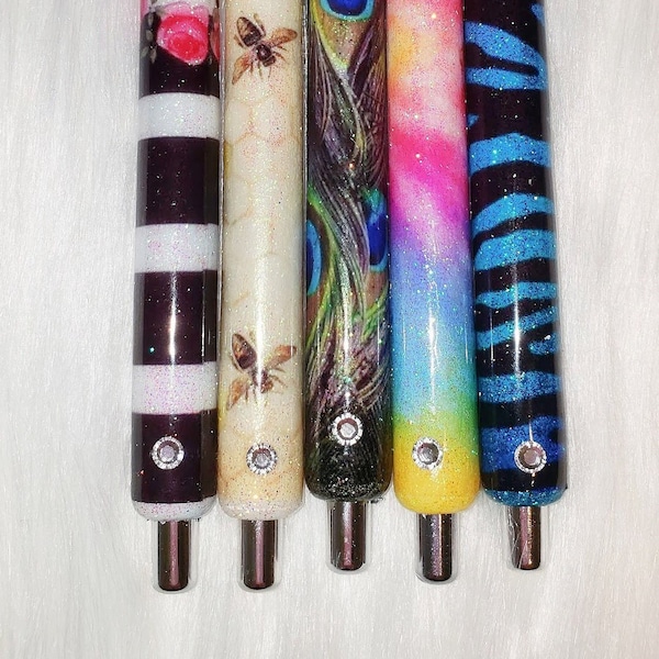 Epoxy Pens With Swarovski Crystal. #bee #floral #tiedye #peacock #zebra #pens #swarovski #holiday #gifts