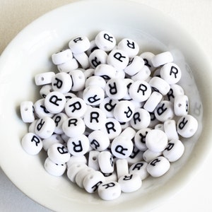 Letter R Plastic Alphabet Beads, White With Black Initial, 7mm x 3.5mm - 100 pieces (BTR)
