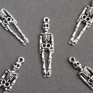 10 Skeleton Charms, Silver Tone Halloween Goth Pendants, 39mm x 9mm (1740)