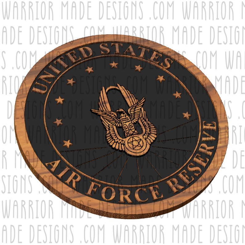 May include: A wooden plaque with a black and brown design. The plaque features the words "United States Air Force Reserve" and a stylized eagle with wings spread. The plaque is a circular shape and has a wood grain texture.