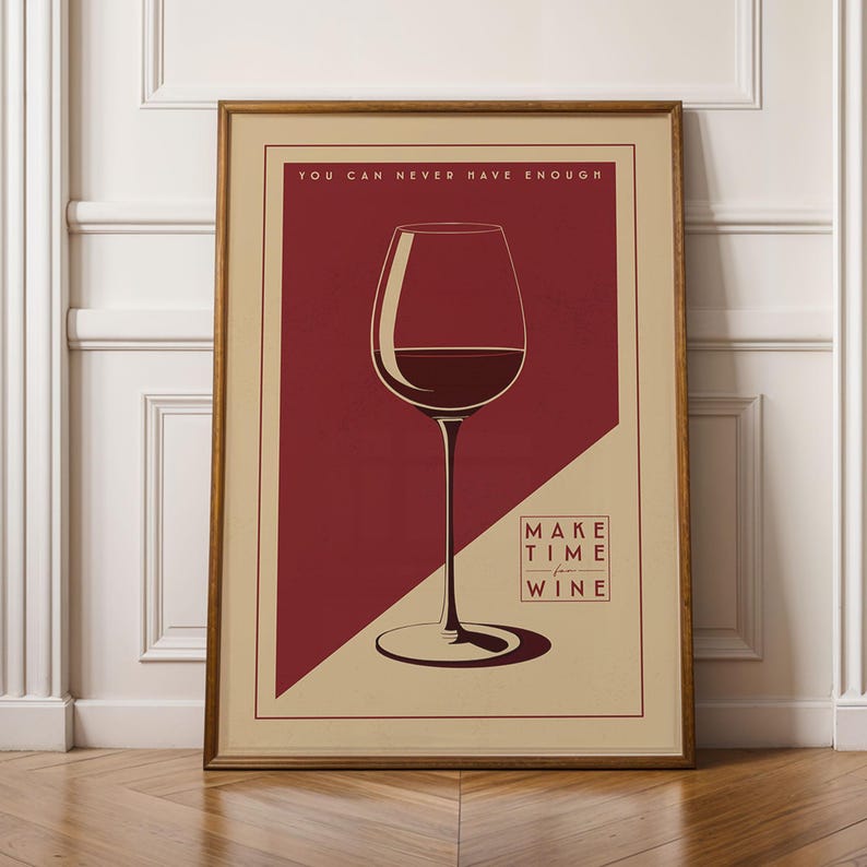 A framed poster with a red background and a wine glass illustration, along with the text "YOU CAN NEVER HAVE ENOUGH" and "MAKE TIME FOR WINE" displayed on it.
