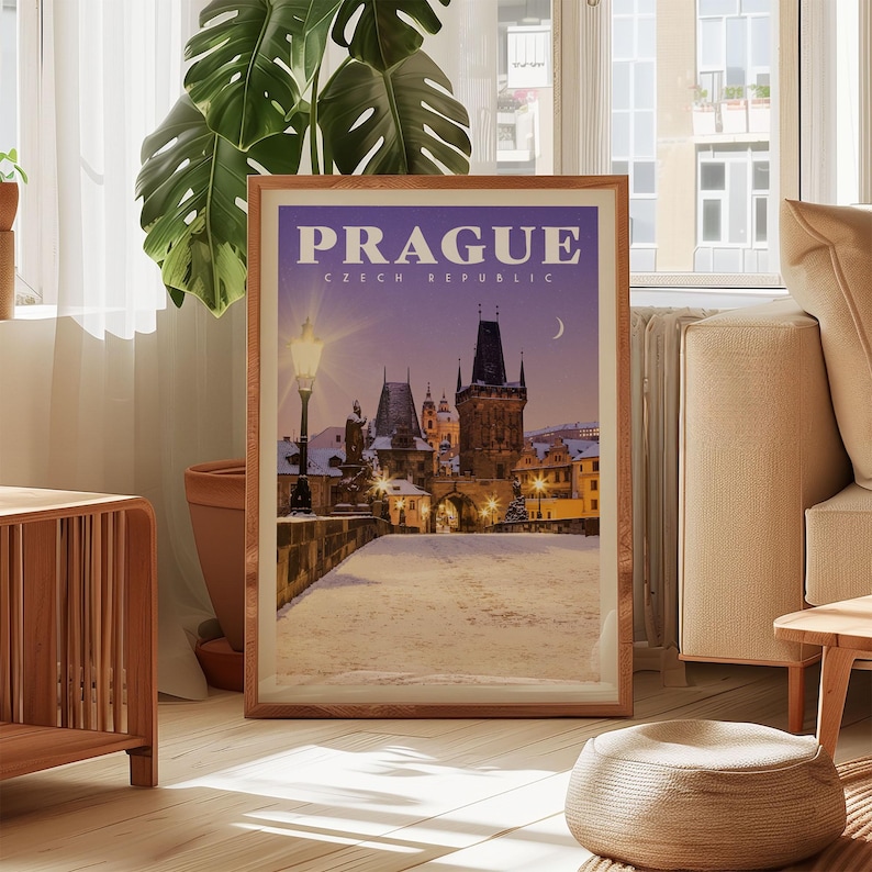 a framed poster of Prague, Czech Republic, with a nighttime view of the Old Town and the Prague Castle, which is illuminated by lights.