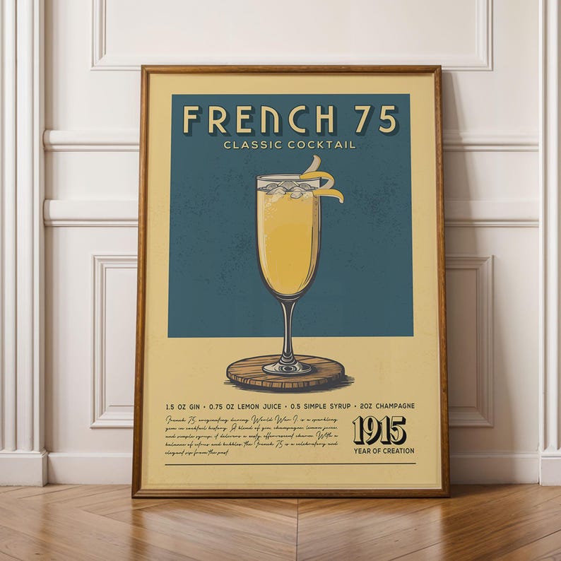 a framed poster advertising a French 75 cocktail.