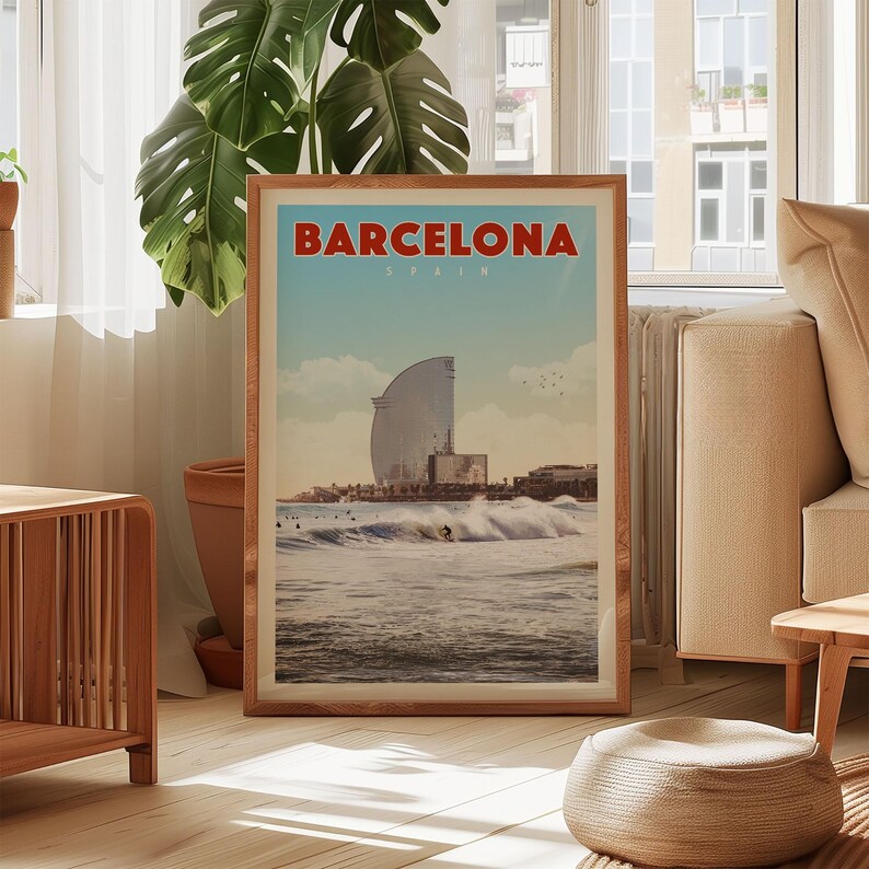 a framed poster of Barcelona, Spain, with a view of the city's skyline and the Mediterranean Sea in the background.