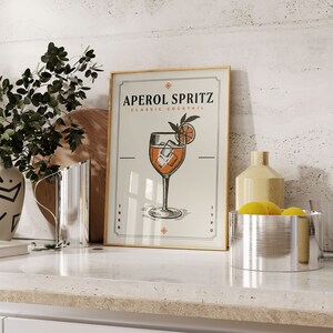 a picture of a glass of aperol spritz on a counter