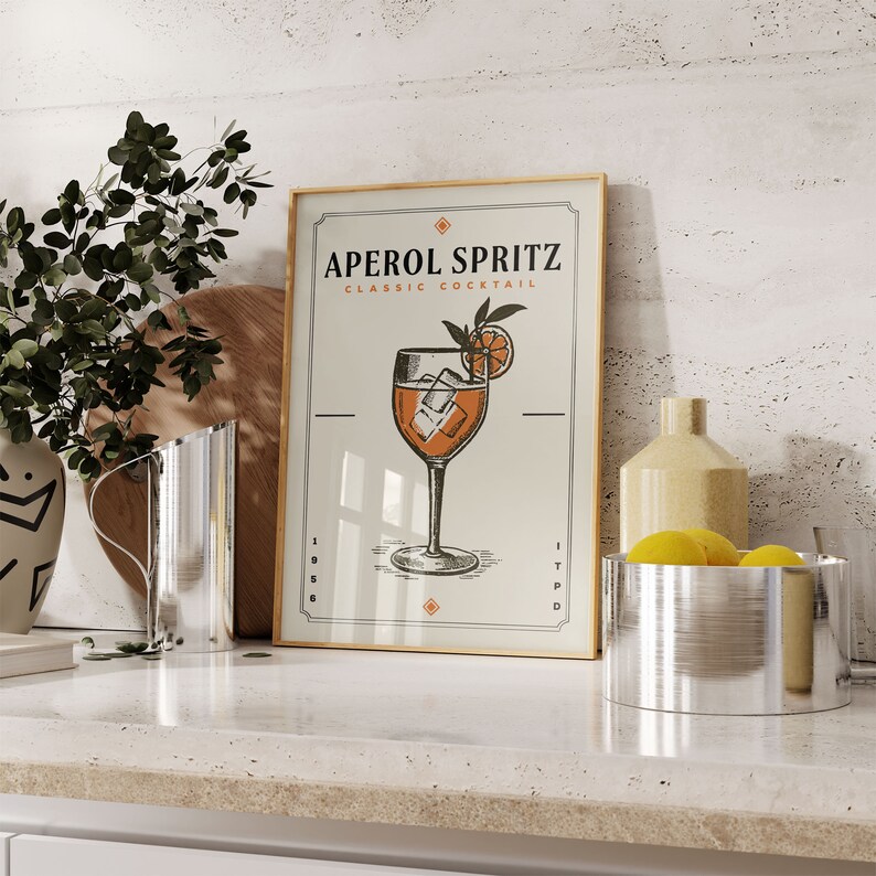 a picture of a glass of aperol spritz on a counter