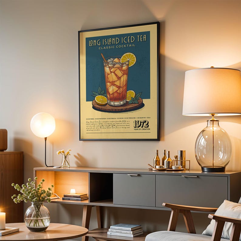 a poster of a Long Island Iced Tea cocktail hanging on a wall in a living room.