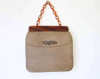 Bolso grande Claire Fashions con asa de cadena de baquelita