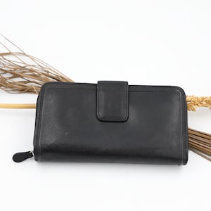 Portefeuille pochette zippée en cuir noir de Rolfs - Portefeuille chéquier pour femme