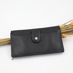 Cartera de piel negra Buxton para mujer