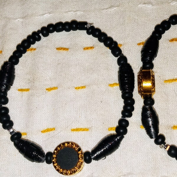 Solar Eclipse unisex stretch bead bracelet Black Gold tone glass, silver tone plated hematite +. One of a kind Dramatic
