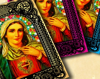May include: Three religious art prints depicting a woman with a halo, in a red dress and gold shawl. Each print has a different coloured, ornate, lace-like border: black, pink, and blue. The woman has a heart on her chest.